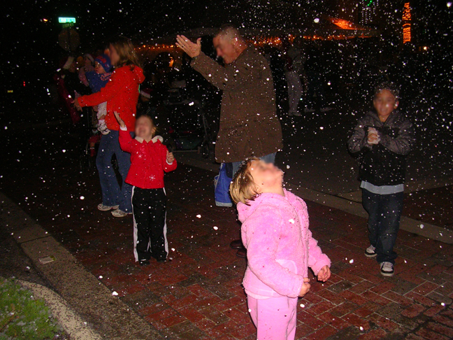 fake snow  snow falls ourdoors for a city winter festivak