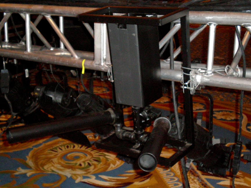 big shot confetti cannons being shot on truss