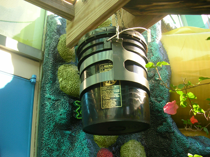 snow fluid supply hanging next to machine